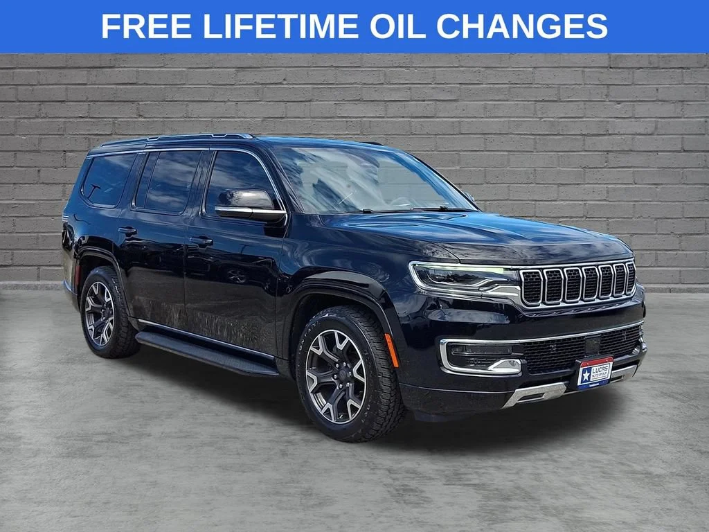 Used 2023 Diamond Black Crystal Pearlcoat Jeep Series III image 1