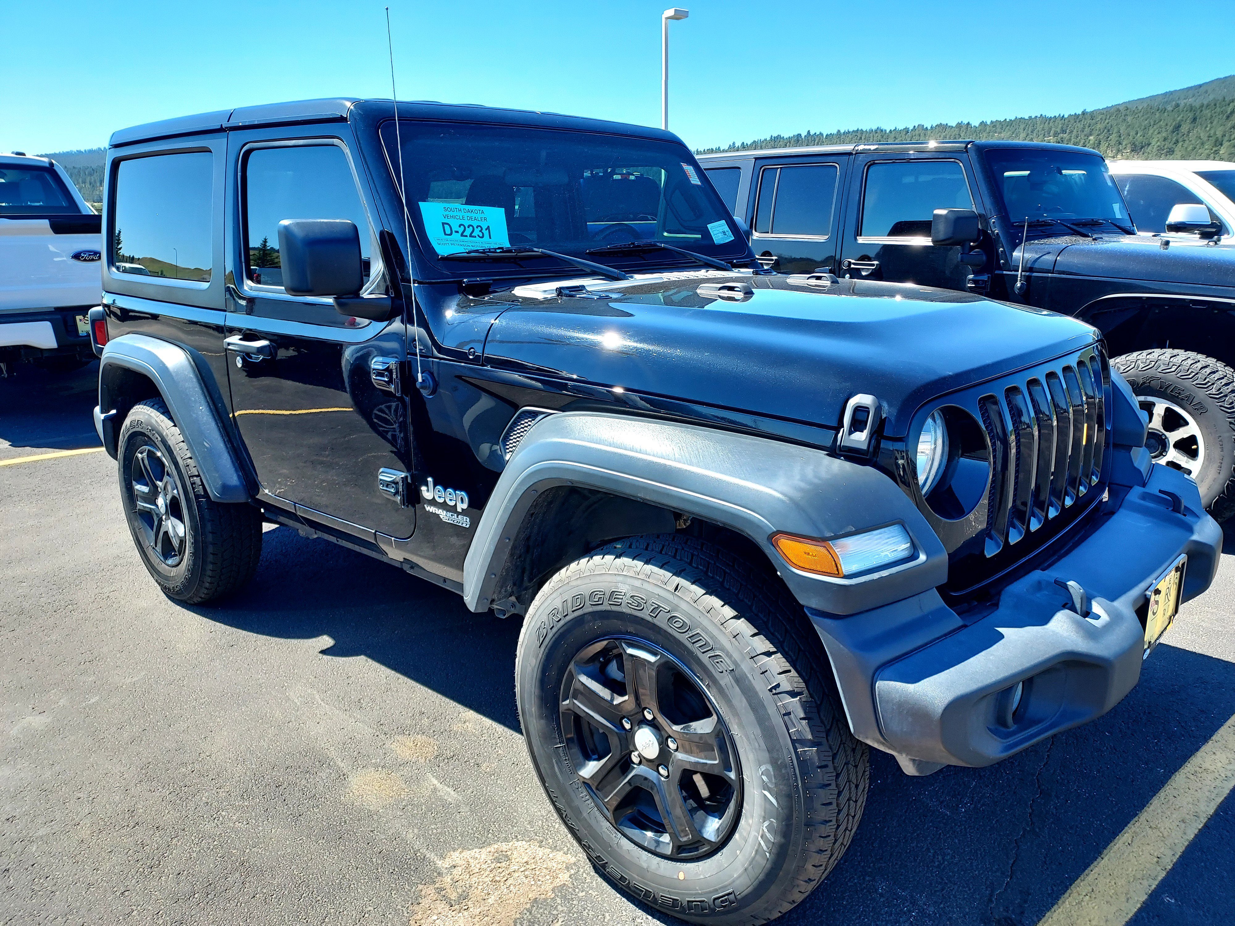 Used 2018 Black Clearcoat Jeep Sport S image 9