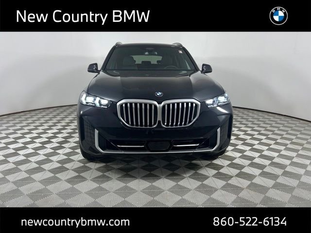 New 2026 Black Sapphire Metallic BMW xDrive40i image 2