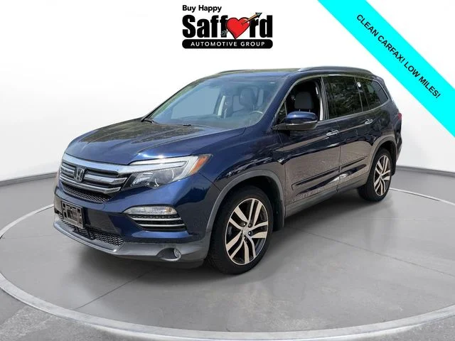 Used 2016 Obsidian Blue Pearl Honda Elite image 1