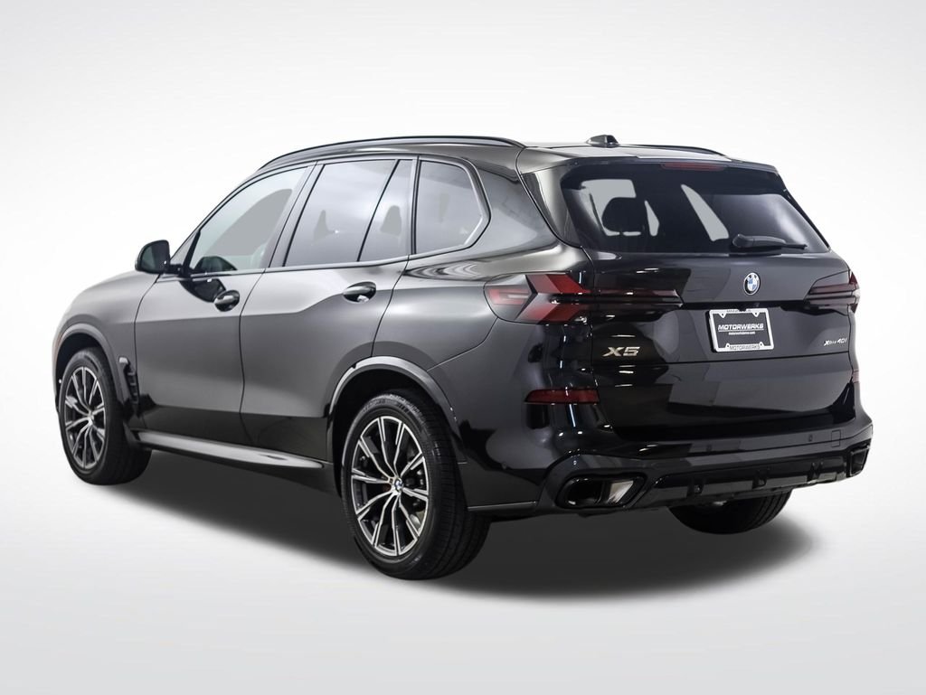 Certified Used 2024 Black Sapphire Metallic BMW xDrive40i image 3