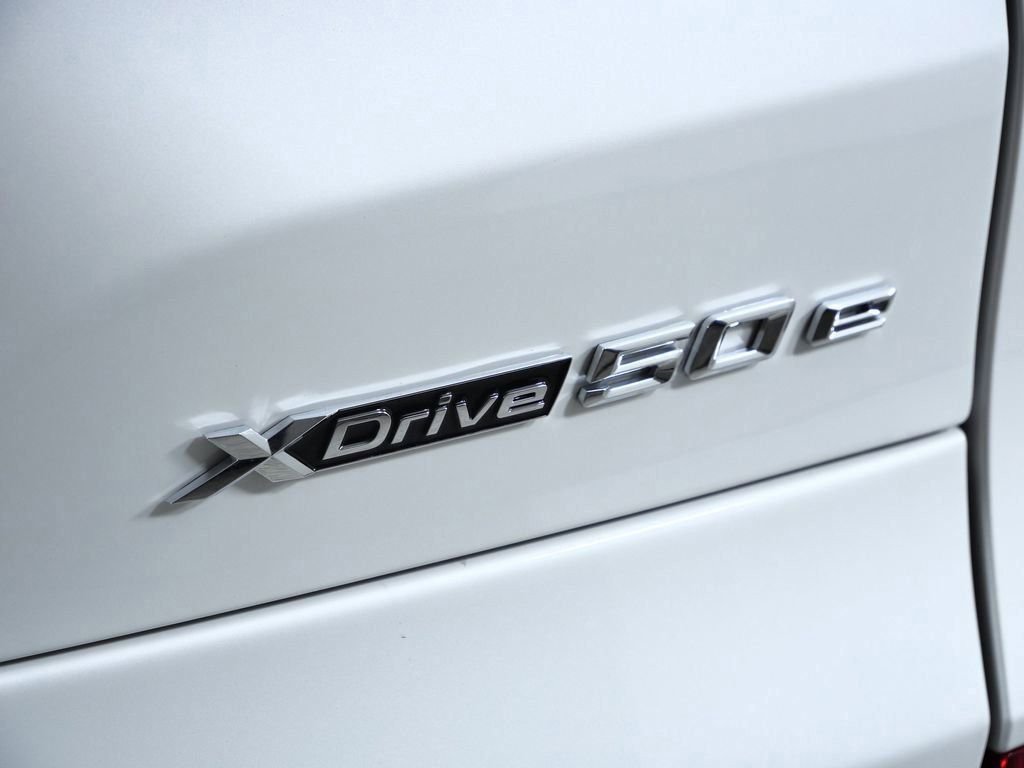 Used 2026 Mineral White Metallic BMW xDrive50e image 13