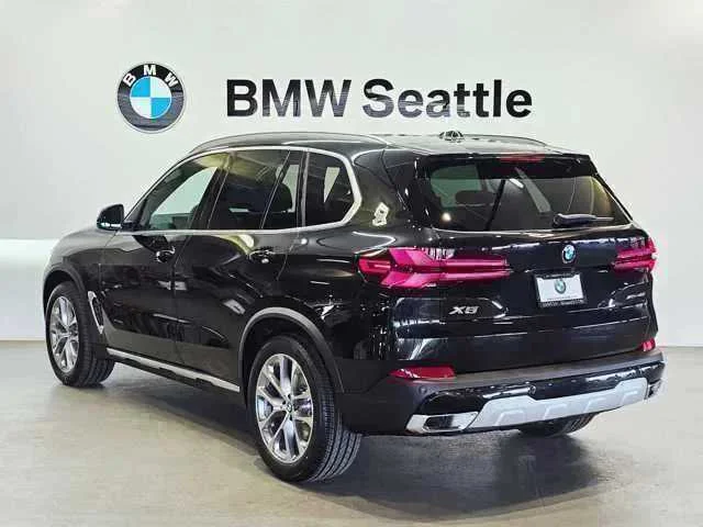 Certified Used 2026 Black Sapphire Metallic BMW xDrive40i image 4