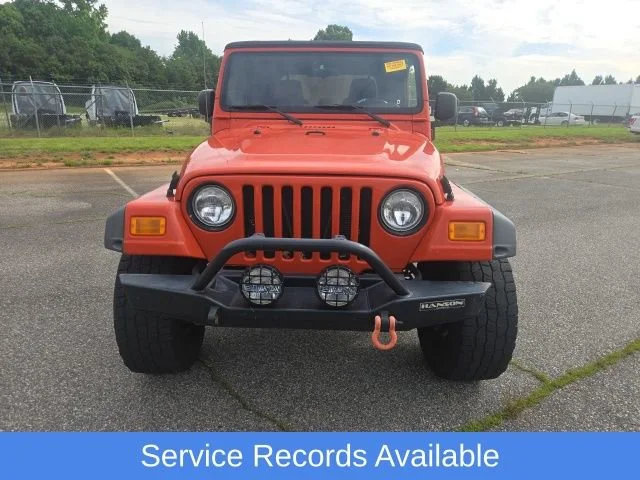 Used 2005 Impact Orange Cle Jeep Sport image 5