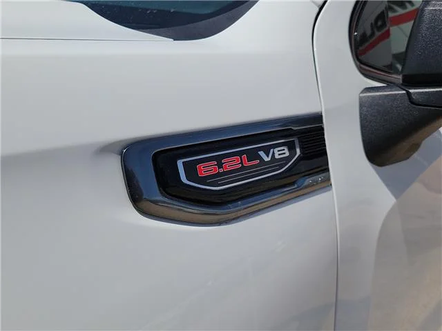 Used 2025 Summit White GMC AT4 4x4 Crew Cab 5.75 ft. box 147.4 in. WB image 2