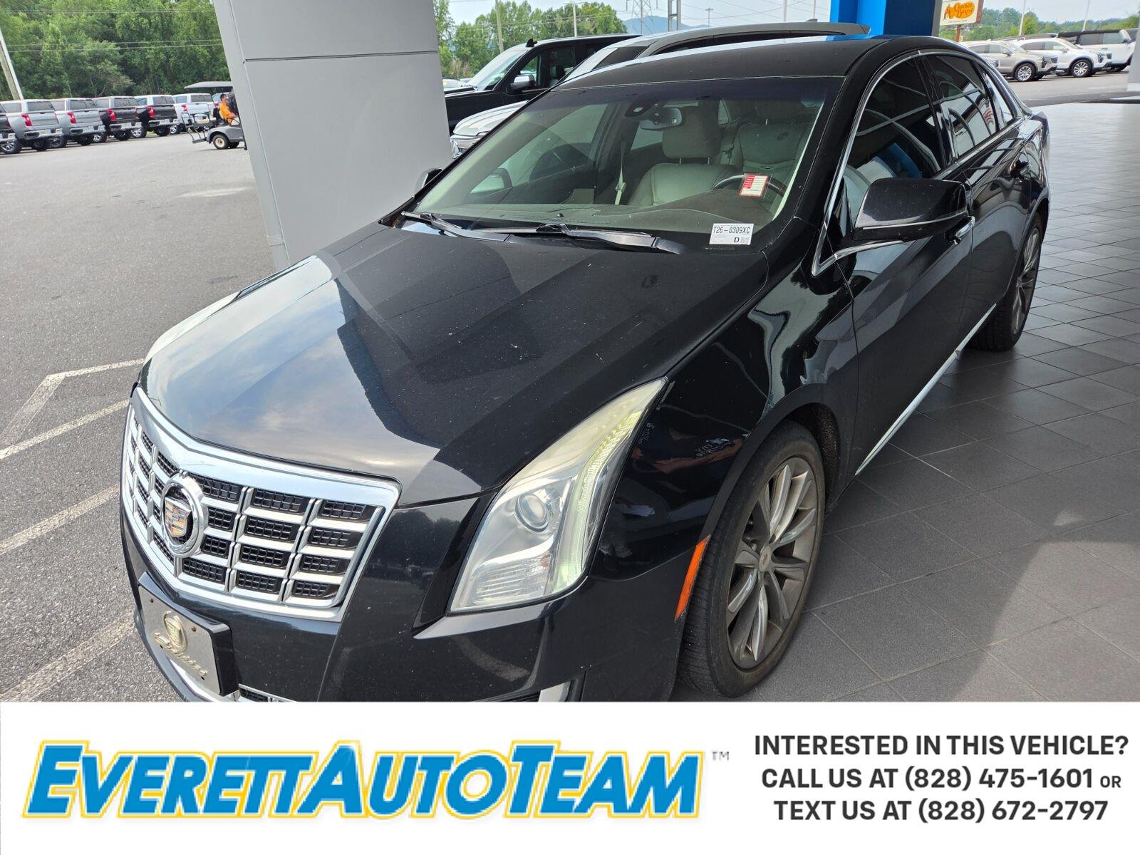 Used 2013 BLACK RAVEN Cadillac 4dr Sdn FWD image 1