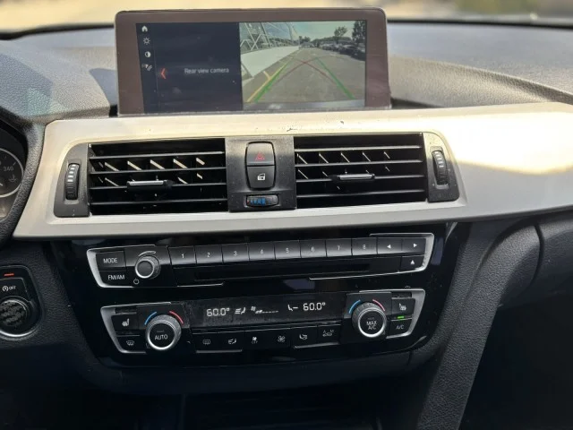 Used 2018 Mineral Gray Metallic BMW 320i xDrive image 26