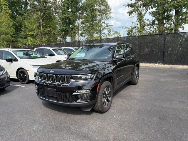 Used 2024 Diamond Black Crystal Pearlcoat Jeep 4xe image 1