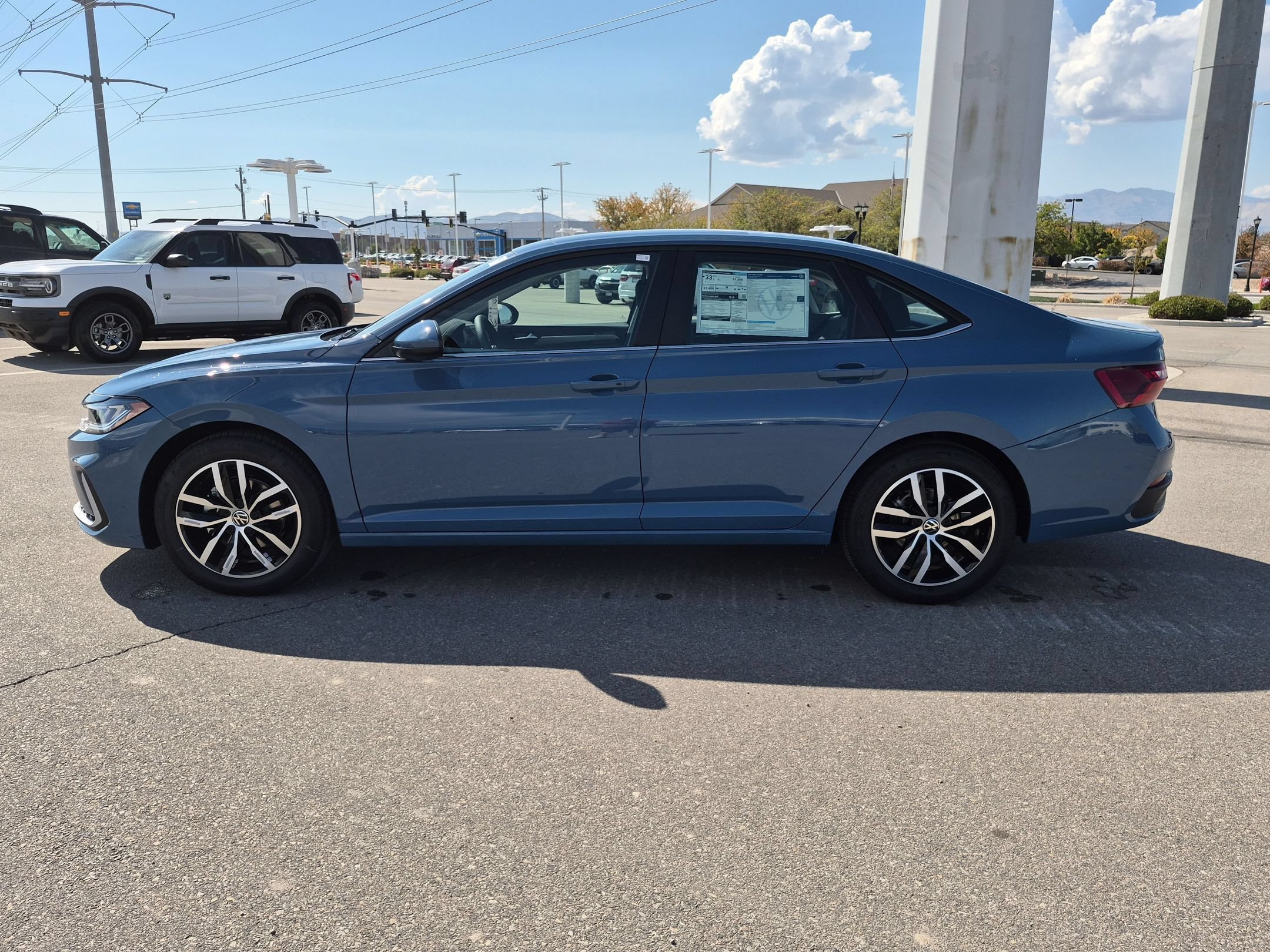 New 2027 Monterey Blue Pearl Volkswagen SE image 7