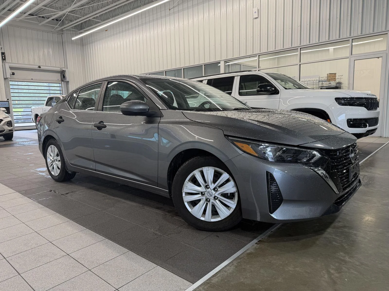 Used 2024 Gun Metallic Nissan S image 3