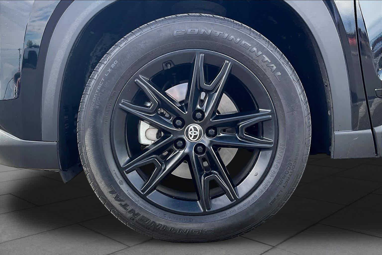 Used 2025 Midnight Black Metallic Toyota Hybrid Nightshade Edition image 11