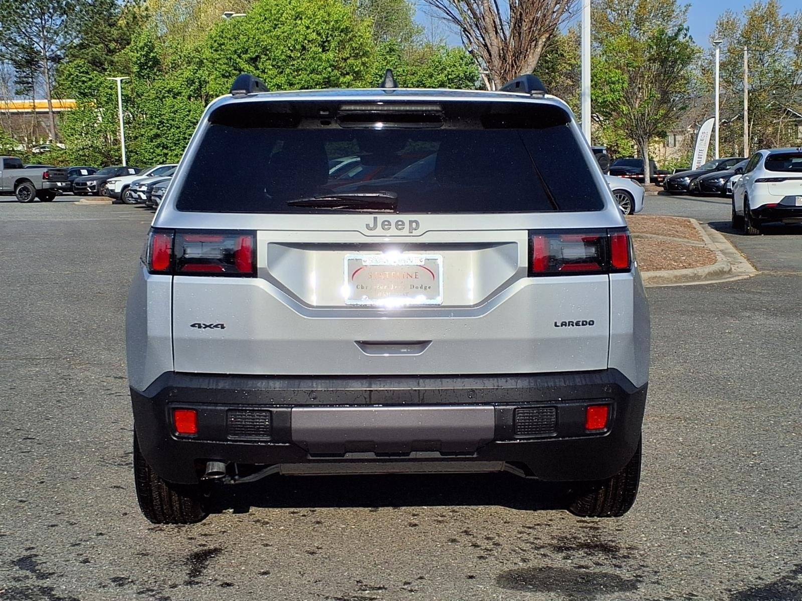 New 2026 Silver Zynith Clearcoat Jeep Laredo image 9