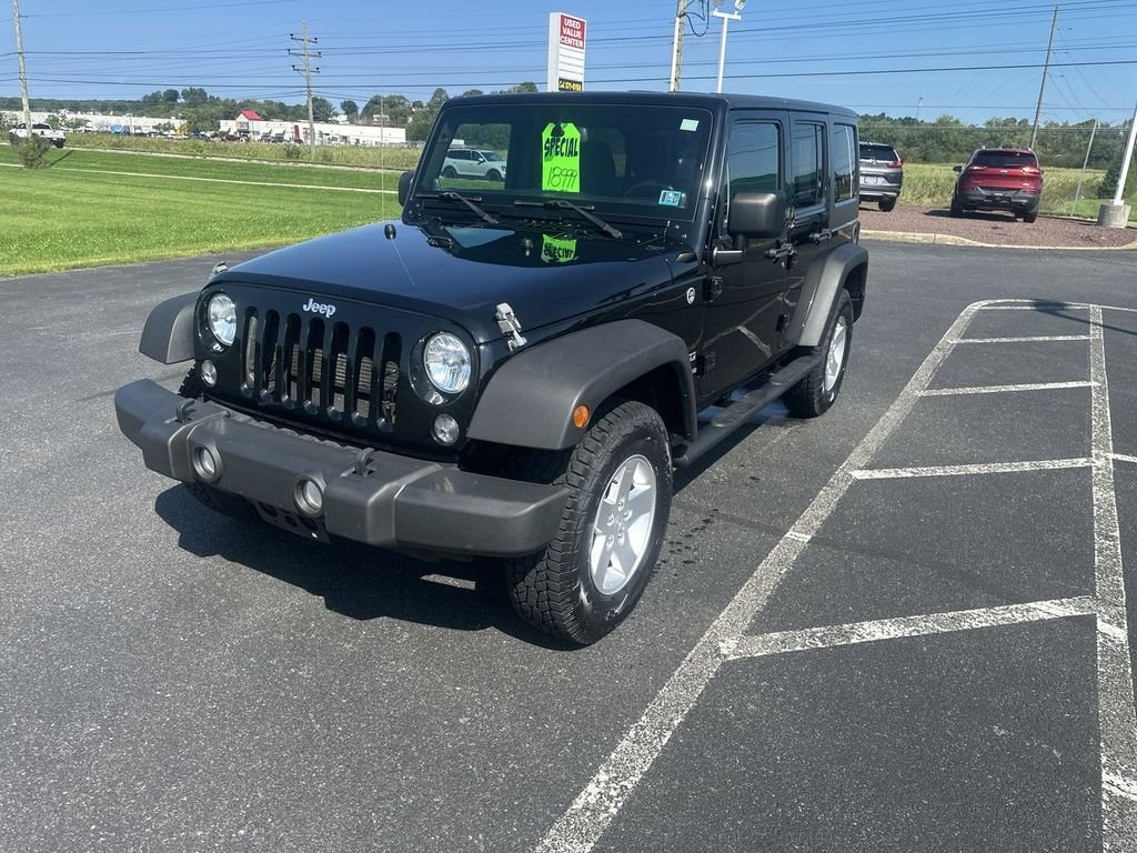 Used 2014 Black Jeep Unlimited Sport image 4