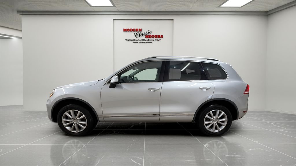 Used 2014 Volkswagen Touareg Sport with VIN WVGEF9BP3ED005451 for sale in Grand Junction, CO