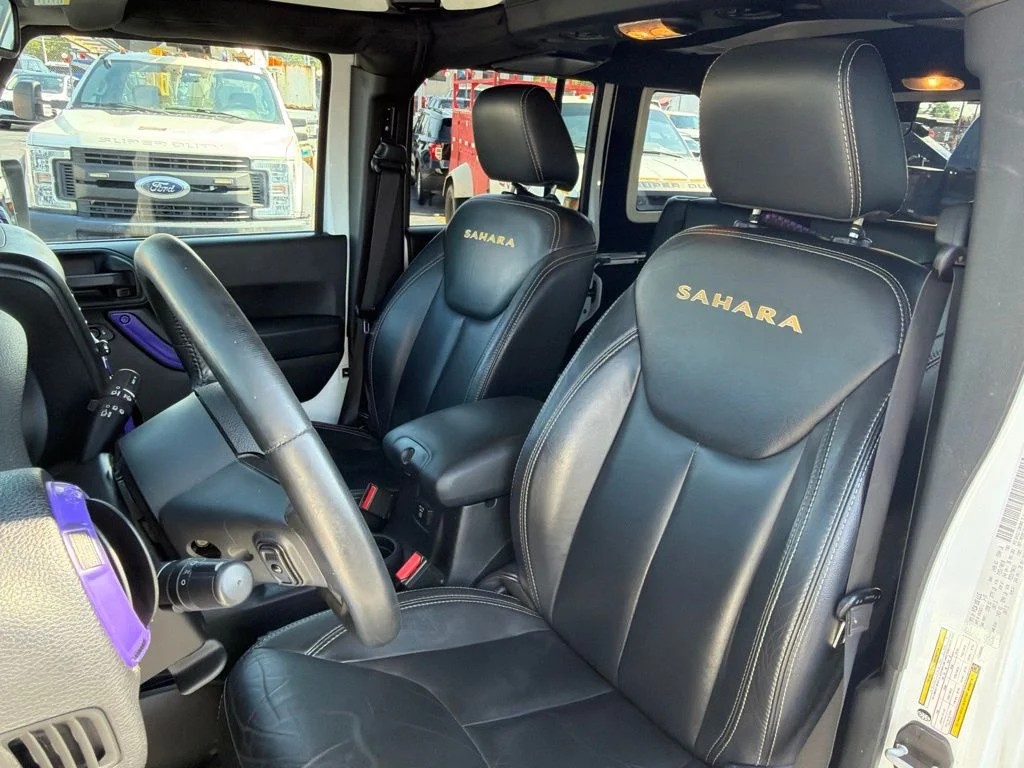 Used 2015 White Jeep Unlimited Sahara image 8
