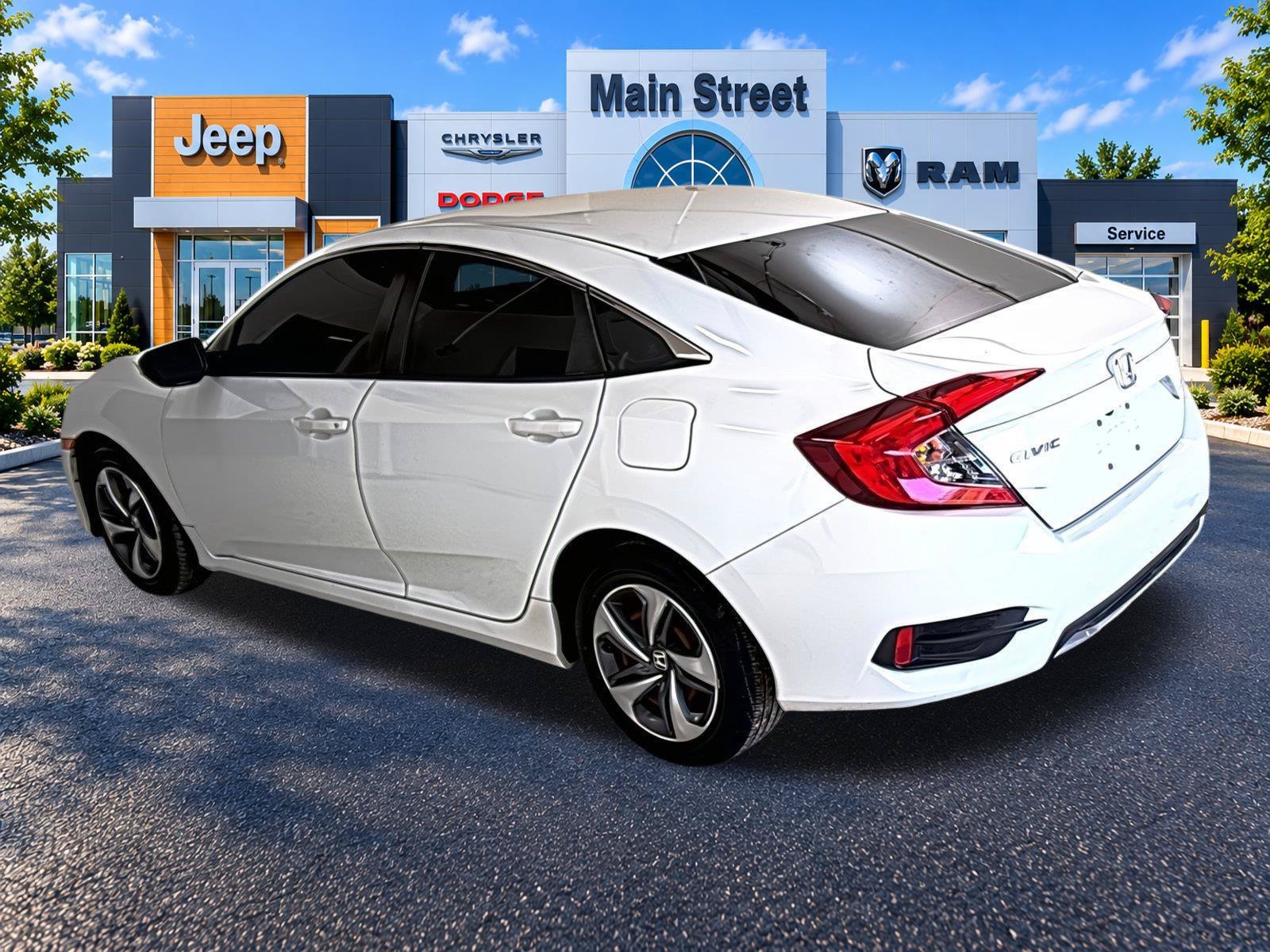Used 2021 Honda Civic LX with VIN 2HGFC2F6XMH557297 for sale in Kansas City