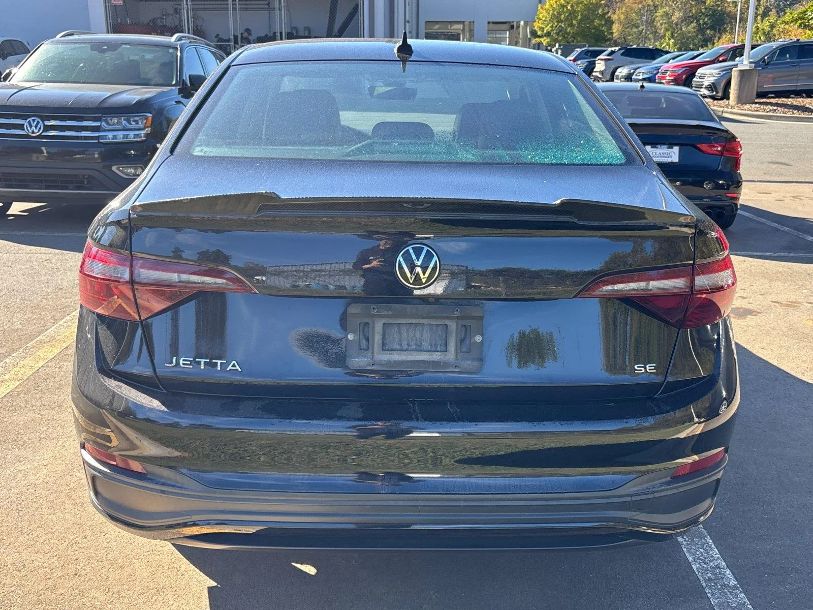 Used 2023 DEEP BLACK VOLKSWAGEN SE image 4