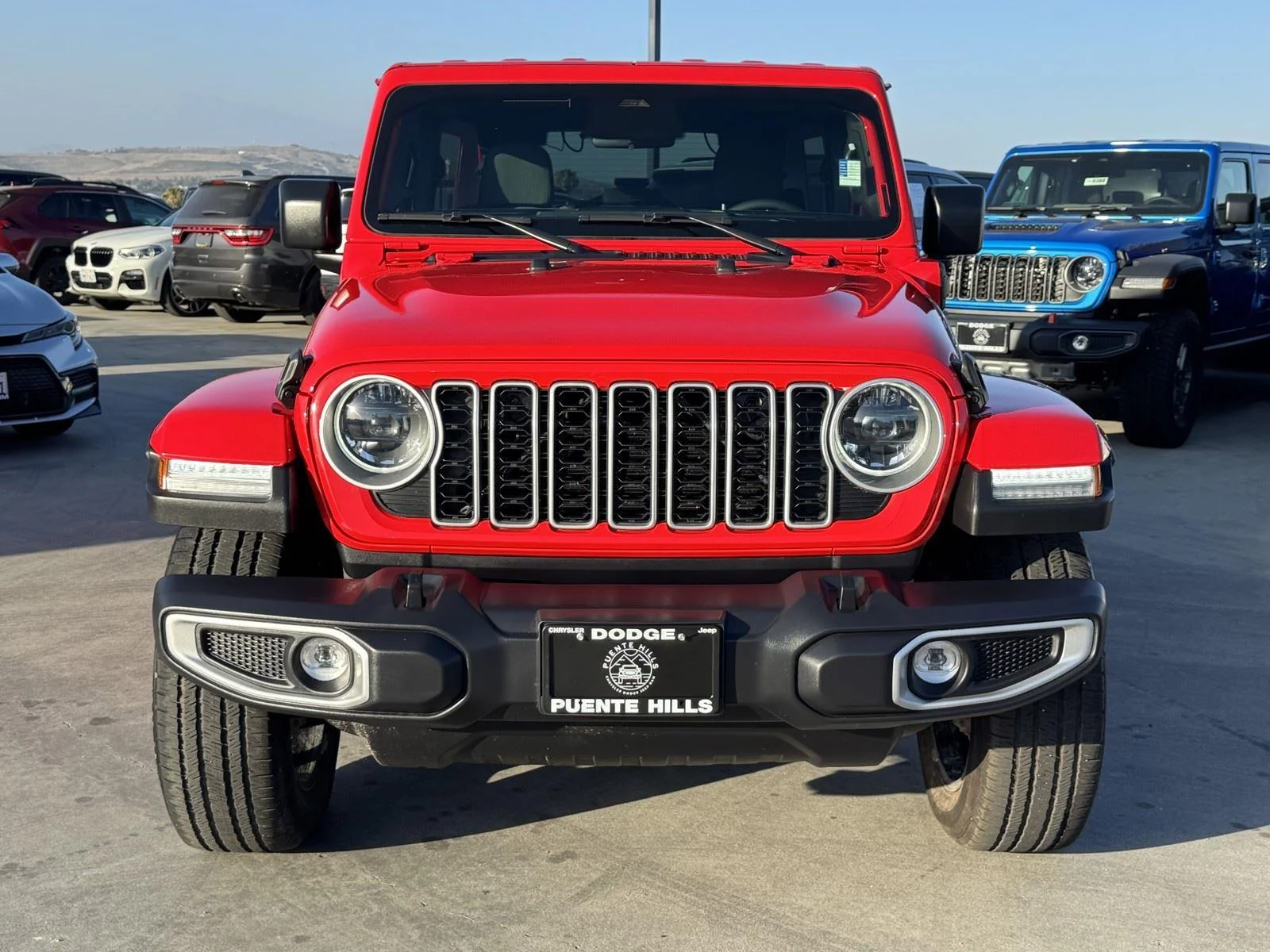 Certified Used 2025 Firecracker Red Clearcoat Jeep Sahara image 2