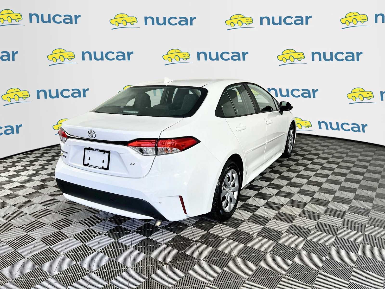 Used 2021 Super White Toyota LE image 7