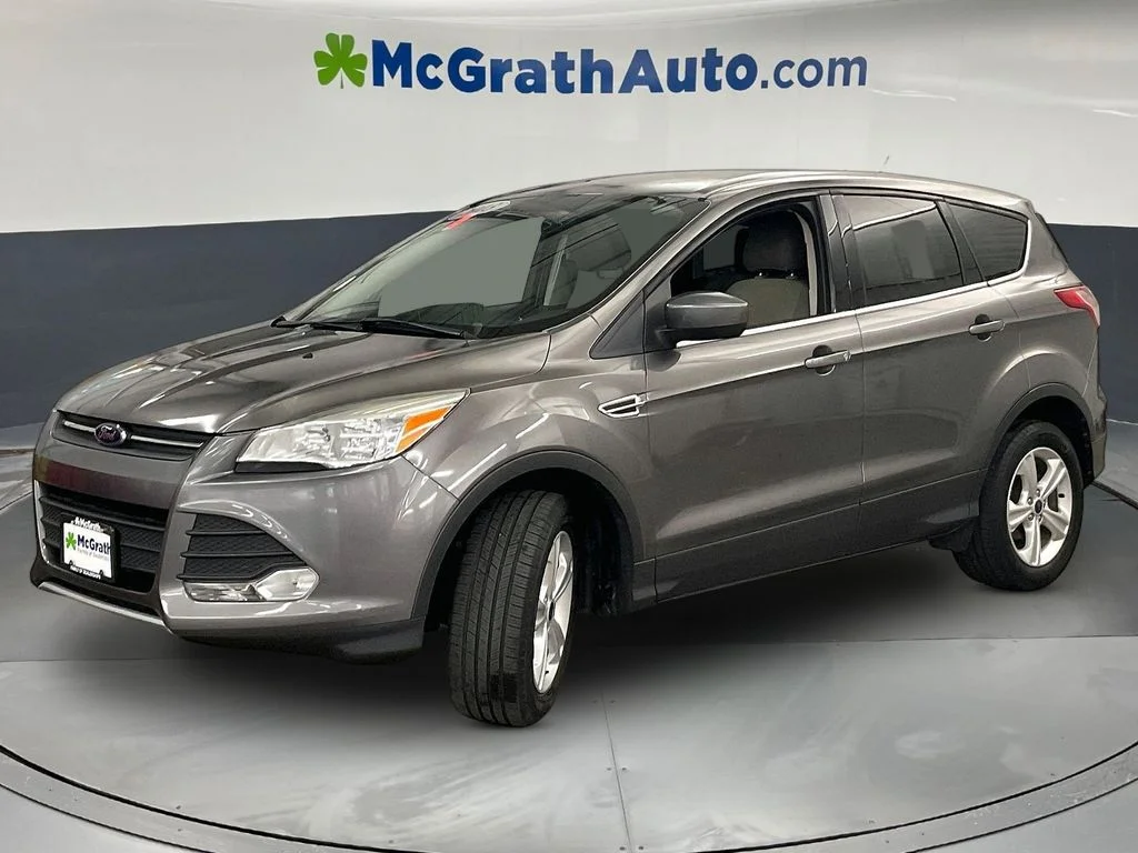Used 2013 Ford Escape SE with VIN 1FMCU9GX9DUD41447 for sale in Iowa City, IA