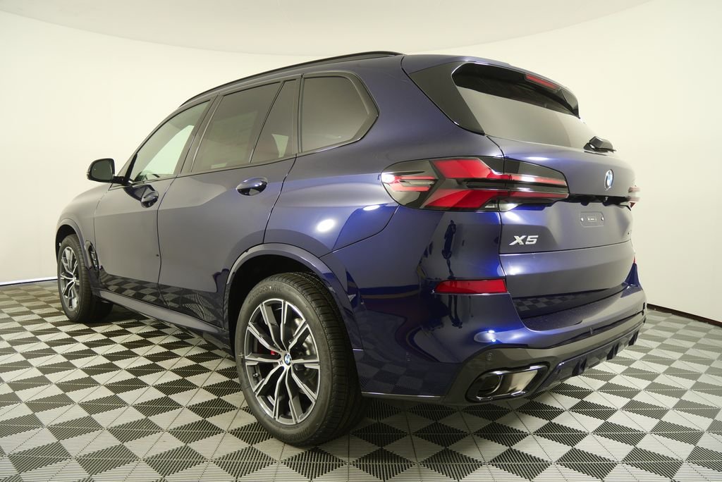 Used 2026 Tanzanite Blue II Metallic BMW xDrive40i image 4