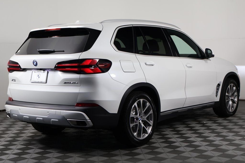 New 2026 Mineral White Metallic BMW xDrive50e image 2