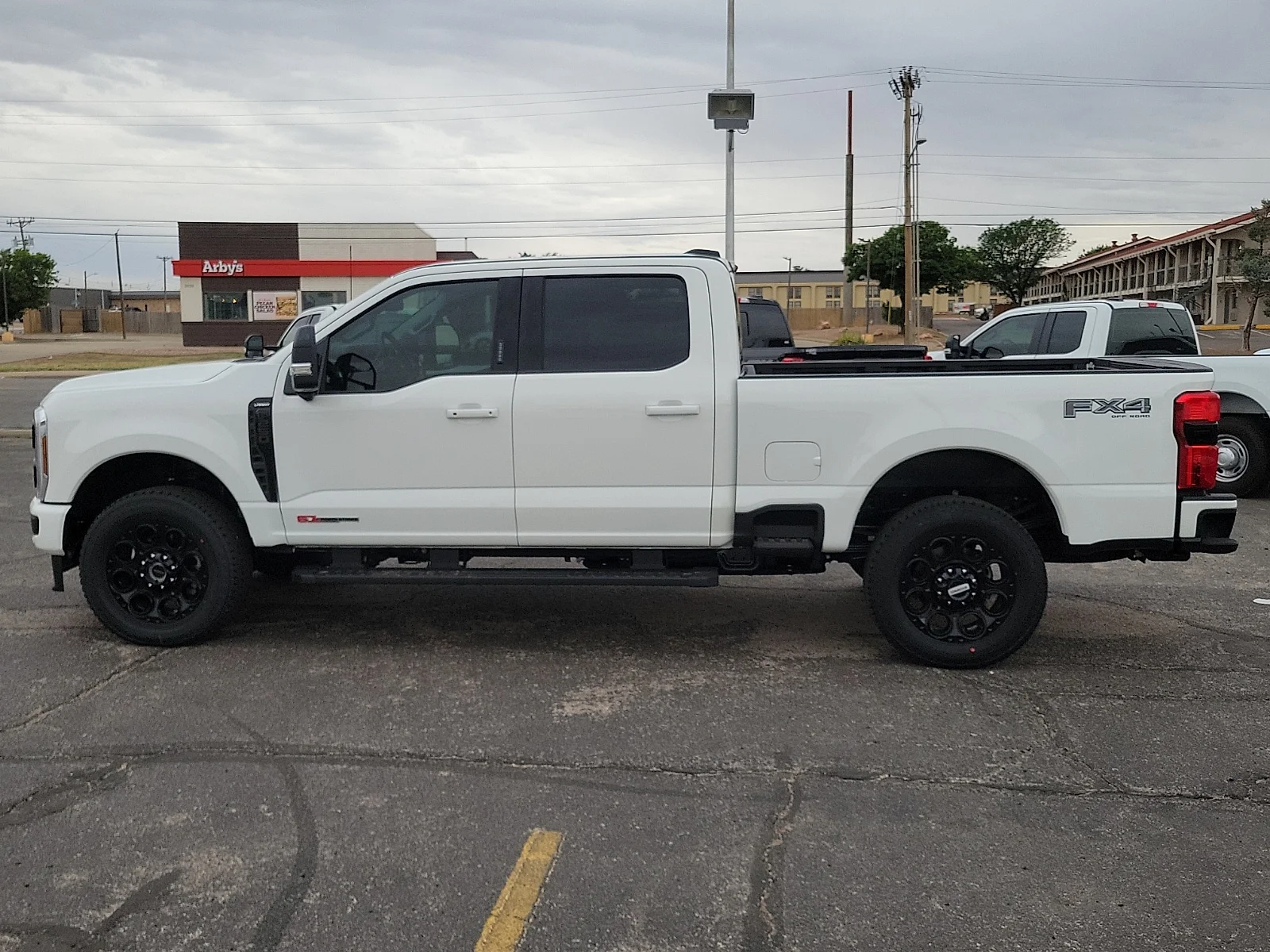 New 2026 Star White Metallic Tri-Coat Ford F-250&reg; Lariat&reg; image 2