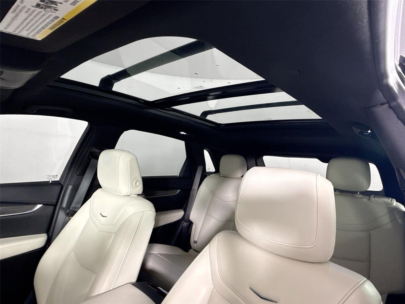 Used 2024 Stellar Black Metallic Cadillac AWD Sport image 6