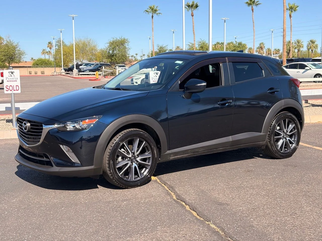 Used 2018 Deep Crystal Blue Mica Mazda Touring image 1