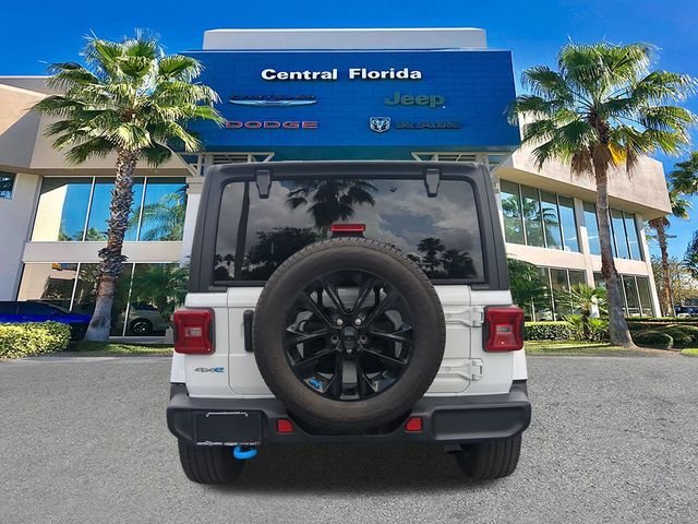 Used 2023 White Jeep Sahara 4xe image 6
