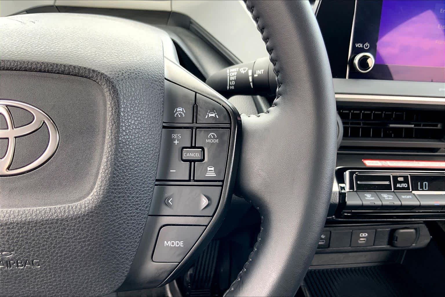 Used 2025 Reservoir Blue Toyota LE image 24
