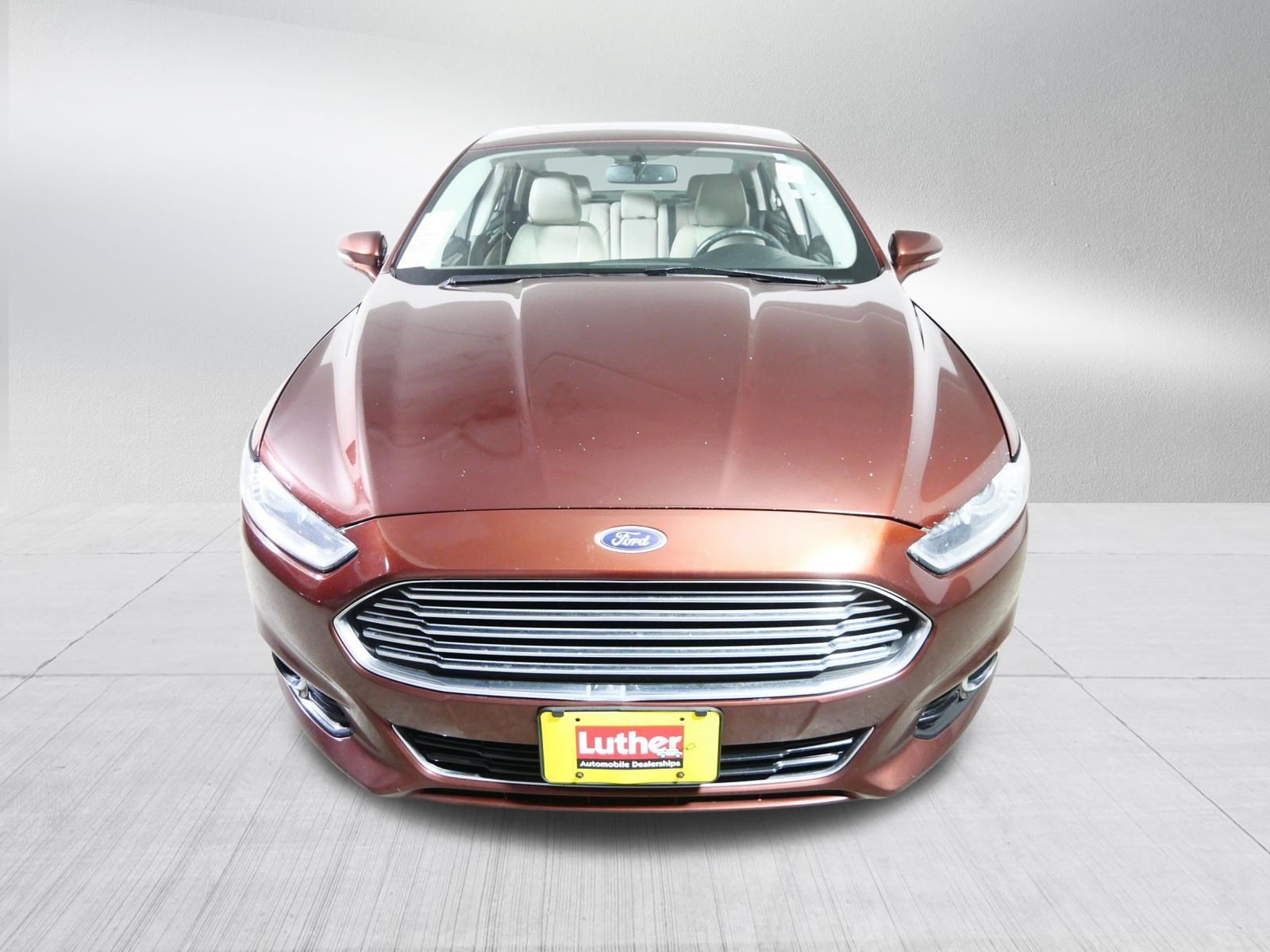 Used 2016 Ford Fusion Titanium with VIN 3FA6P0K91GR219650 for sale in Brooklyn Center, MN