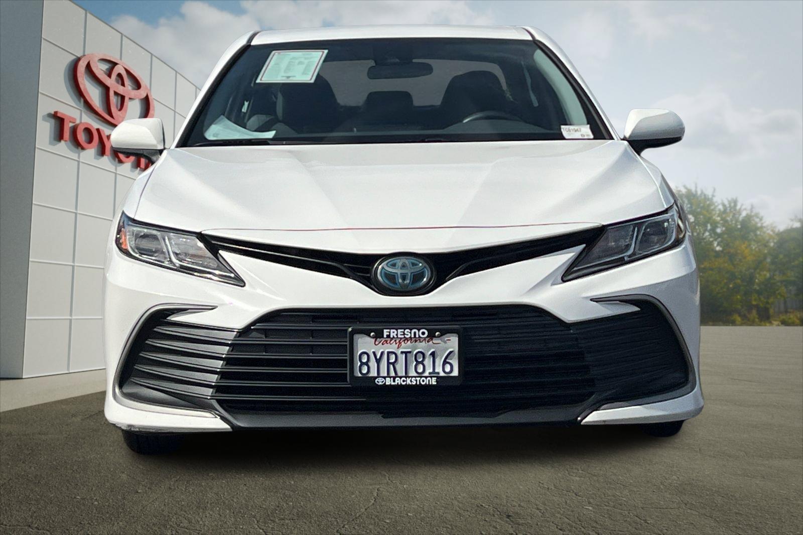 Certified Used 2021 Super White Toyota Hybrid LE image 8