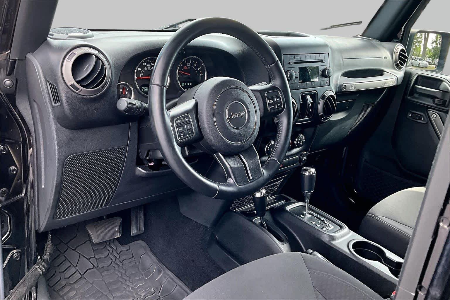 Used 2016 Black Clearcoat Jeep Sport image 16