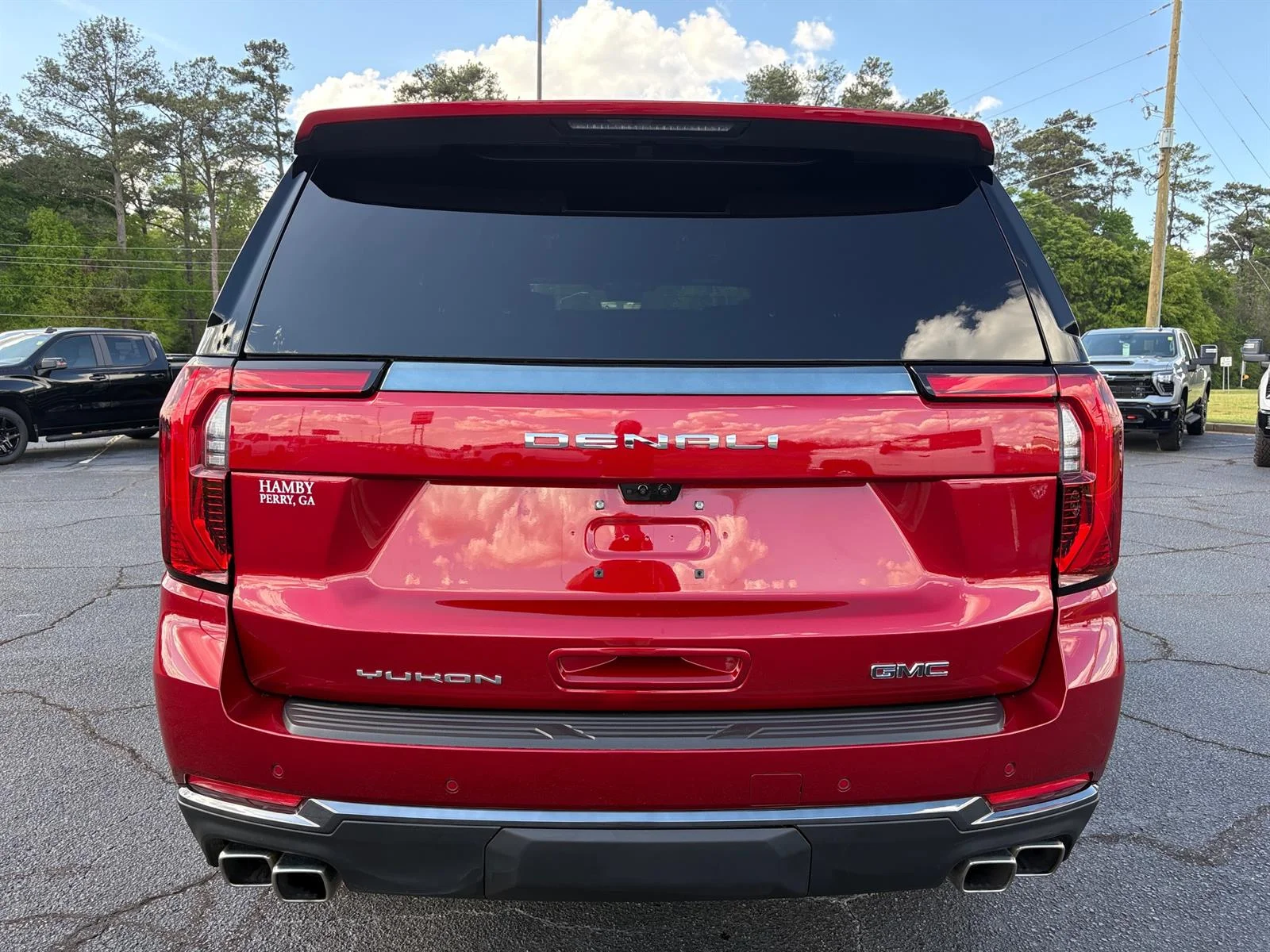 Used 2026 Volcanic Red Tintcoat GMC Denali Ultimate image 8