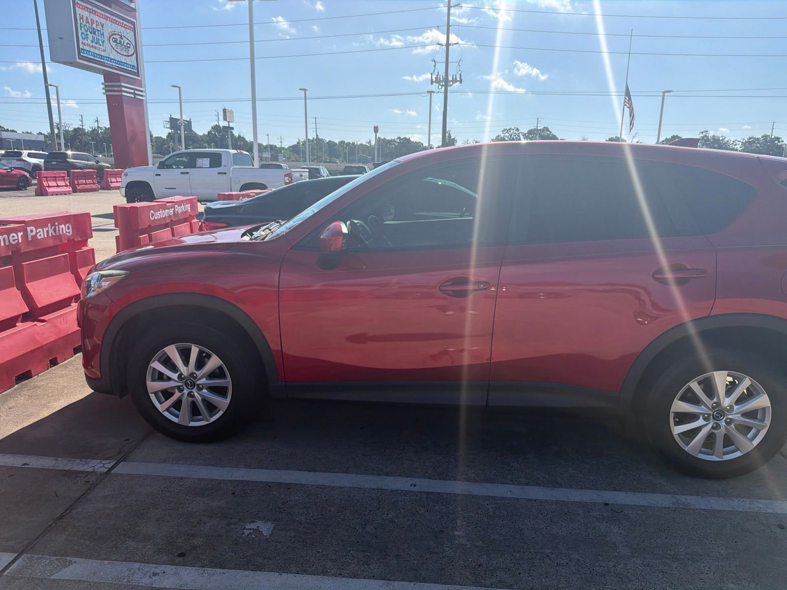 Used 2014 Red Metallic Mazda Touring image 4