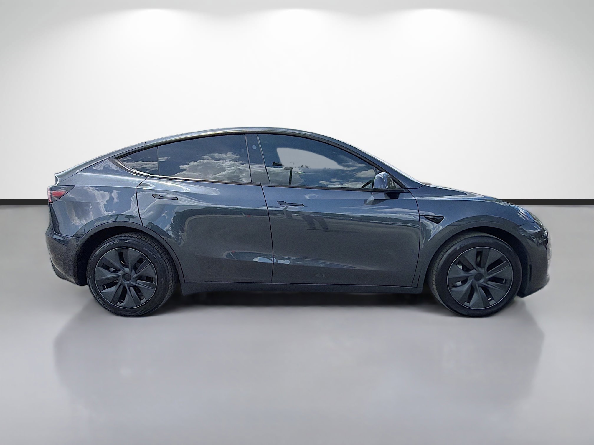 Used 2024 Tesla Model Y Long Range with VIN 7SAYGDEE6RA331948 for sale in Tampa, FL