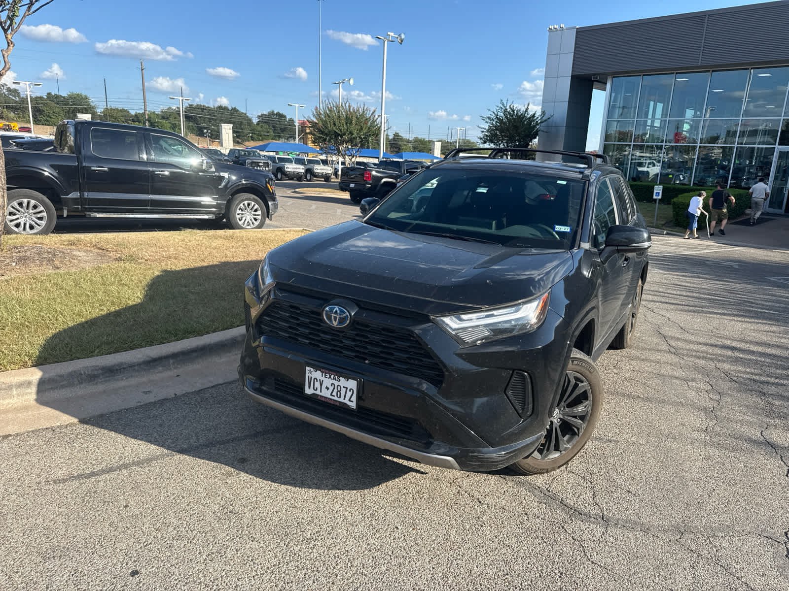 Used 2024 Midnight Black Metallic Toyota Hybrid SE image 3