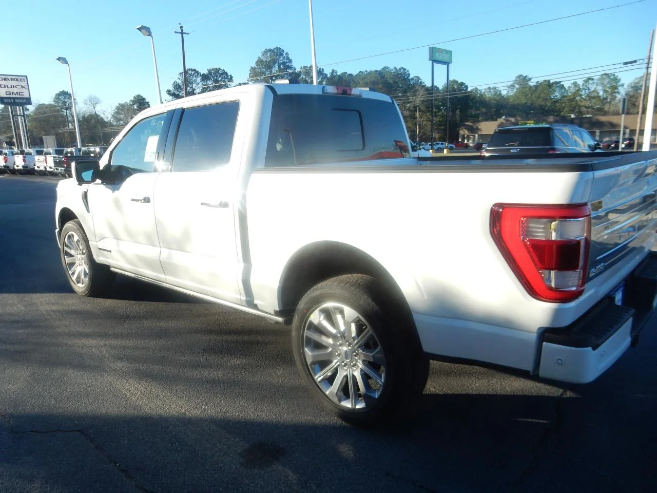 New 2023 Pearl White Ford LIMITED 4WD SUPERCREW 5.5 image 6
