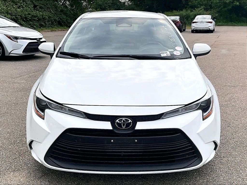Used 2024 White Toyota LE image 2