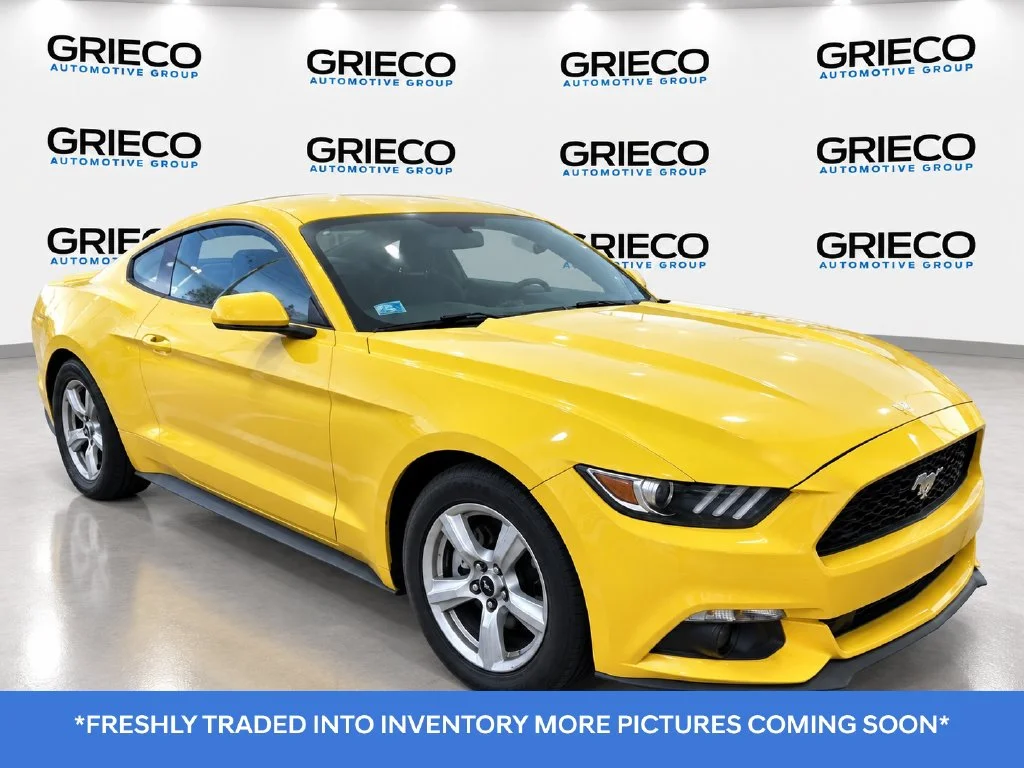 Used 2015 Yellow Ford EcoBoost Premium image 1