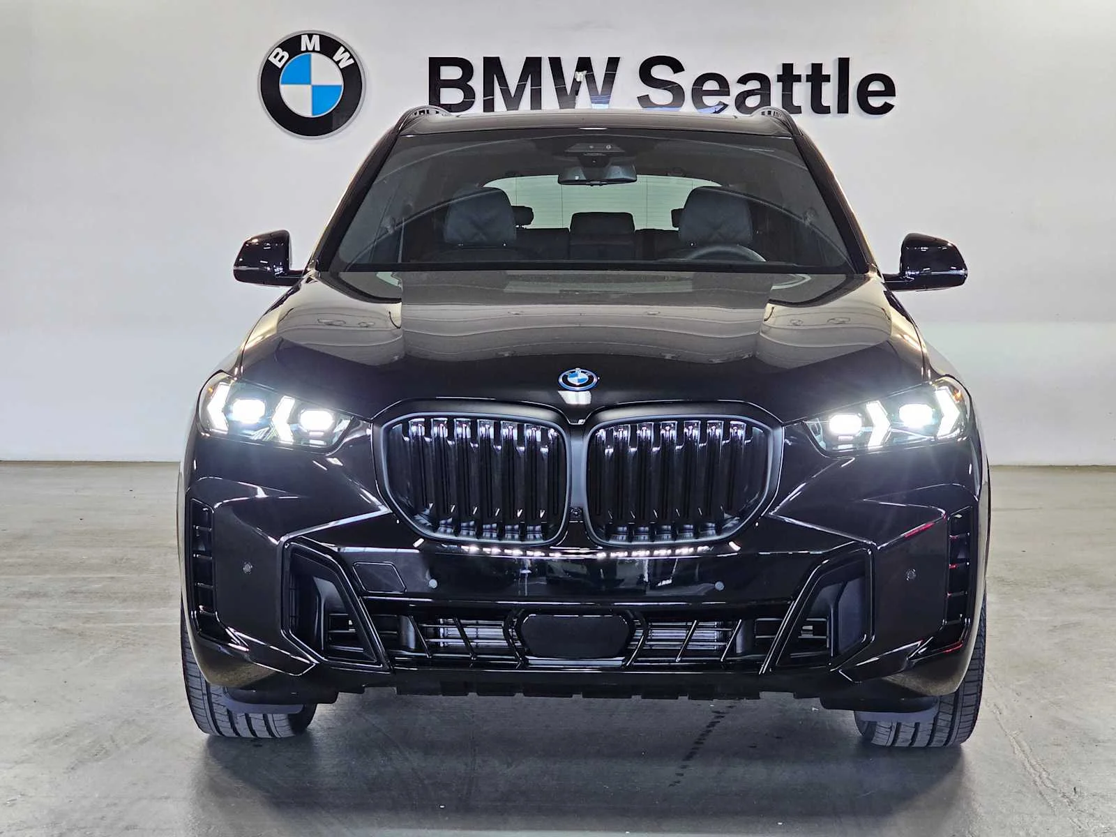 New 2026 Black Sapphire Metallic BMW xDrive50e image 6