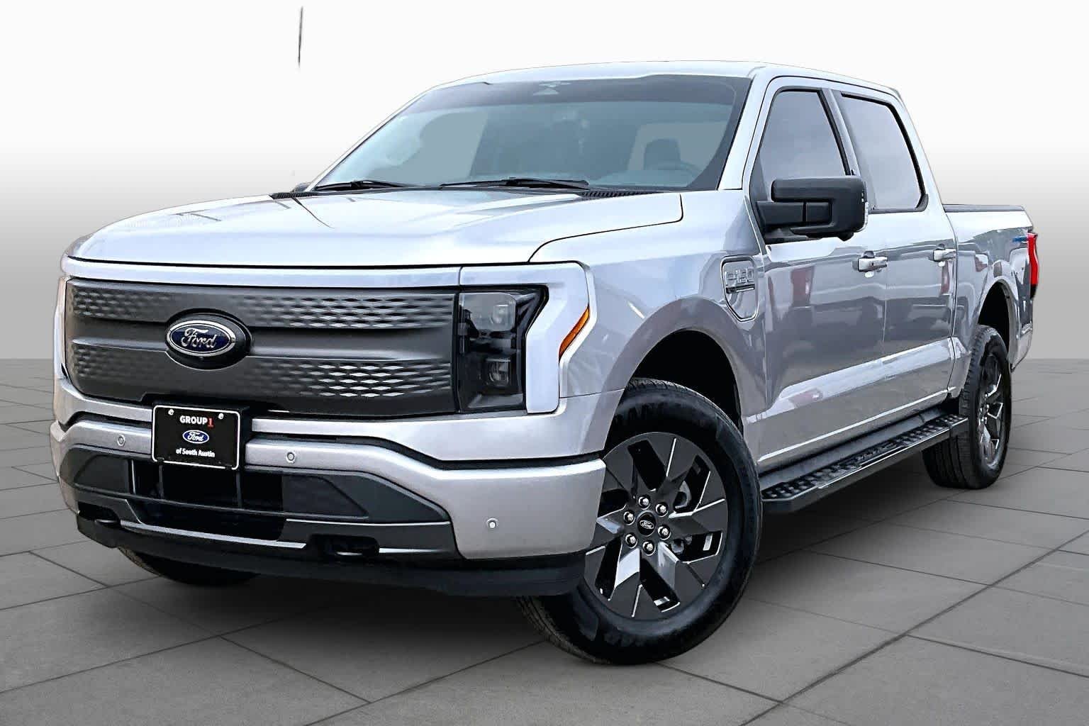 Certified 2023 Ford F-150 Lightning XLT with VIN 1FT6W1EV5PWG36956 for sale in Austin, TX