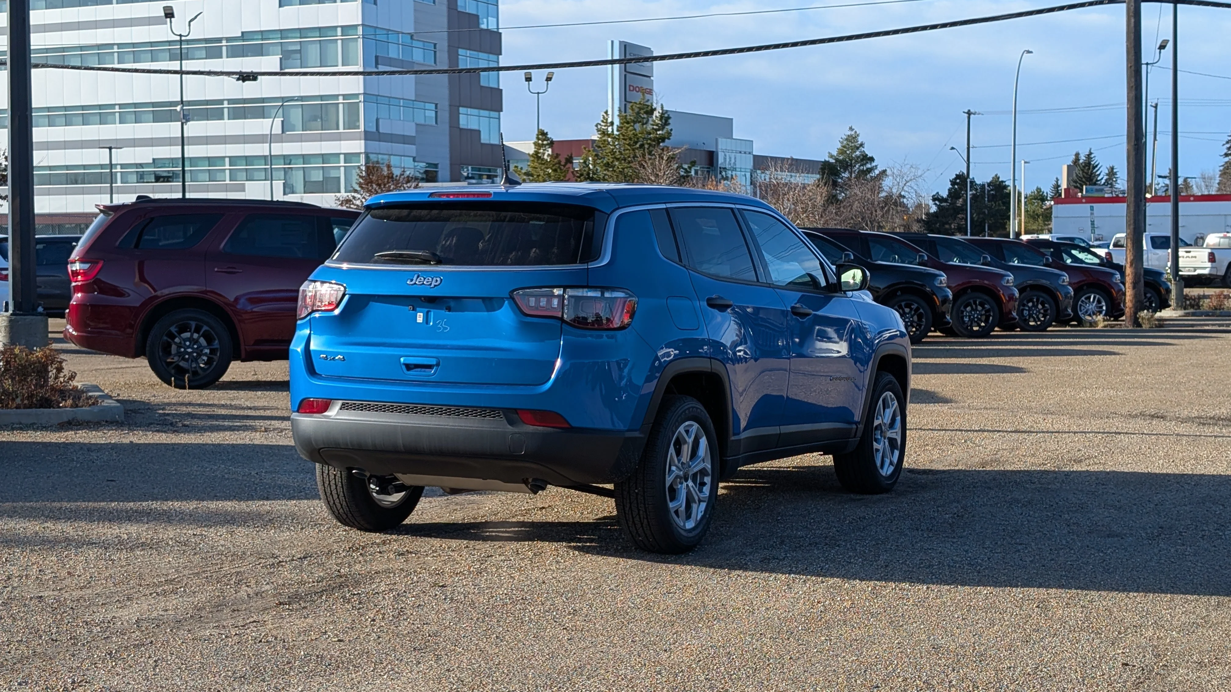 New 2026 Laser Blue Pearl Jeep Sport image 7