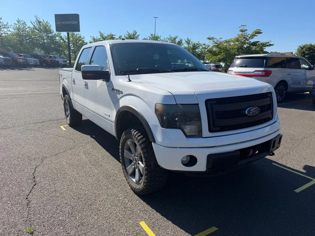 Used 2013 White Ford FX4 image 1