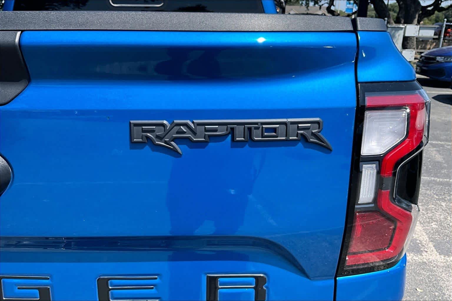 Used 2024 Velocity Blue Metallic Ford Raptor image 10