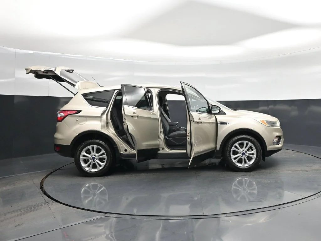 Used 2017 Gold Ford SE image 4