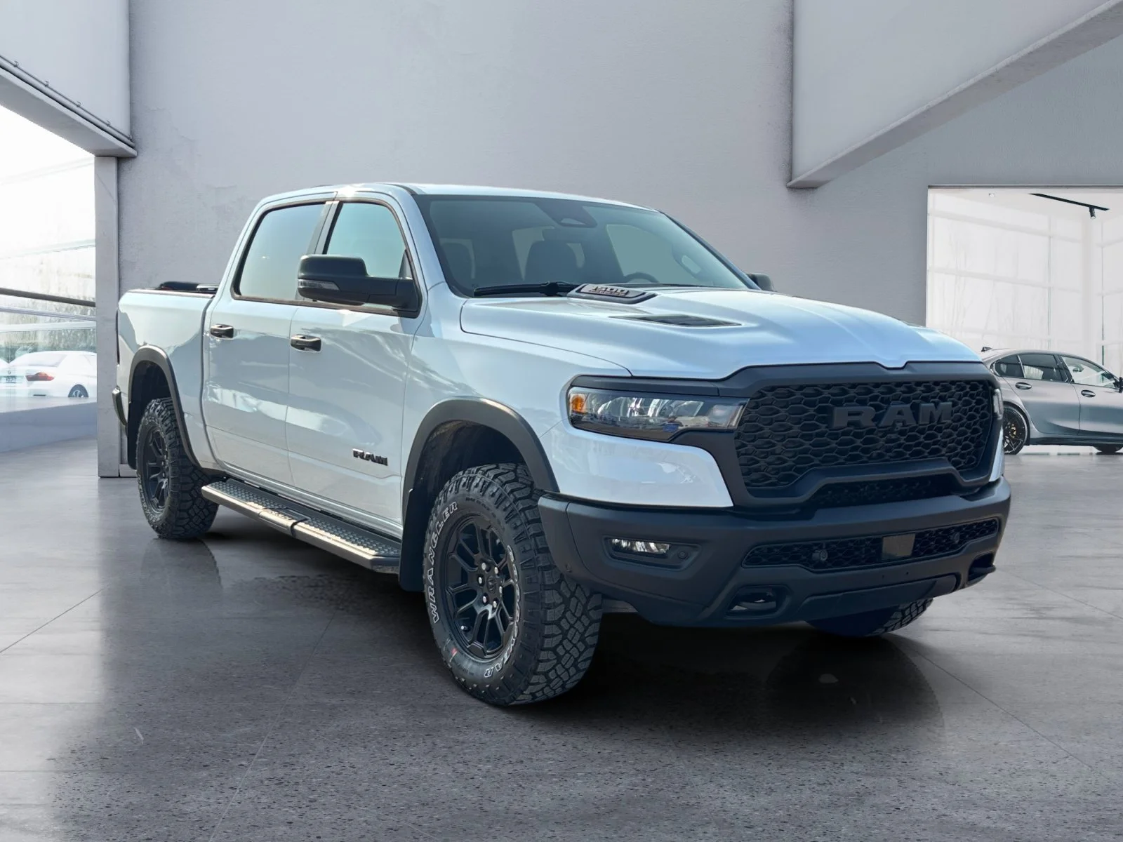 New 2026 Bright White Ram Rebel image 7