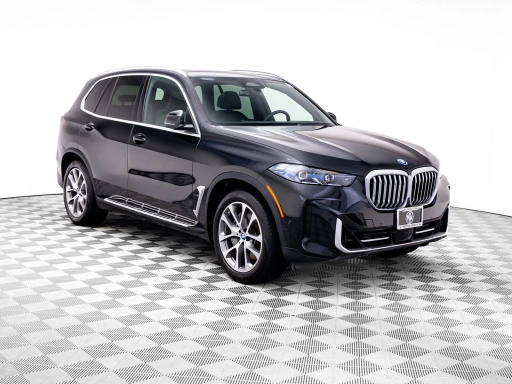 Used 2024 Black BMW xDrive50e image 9