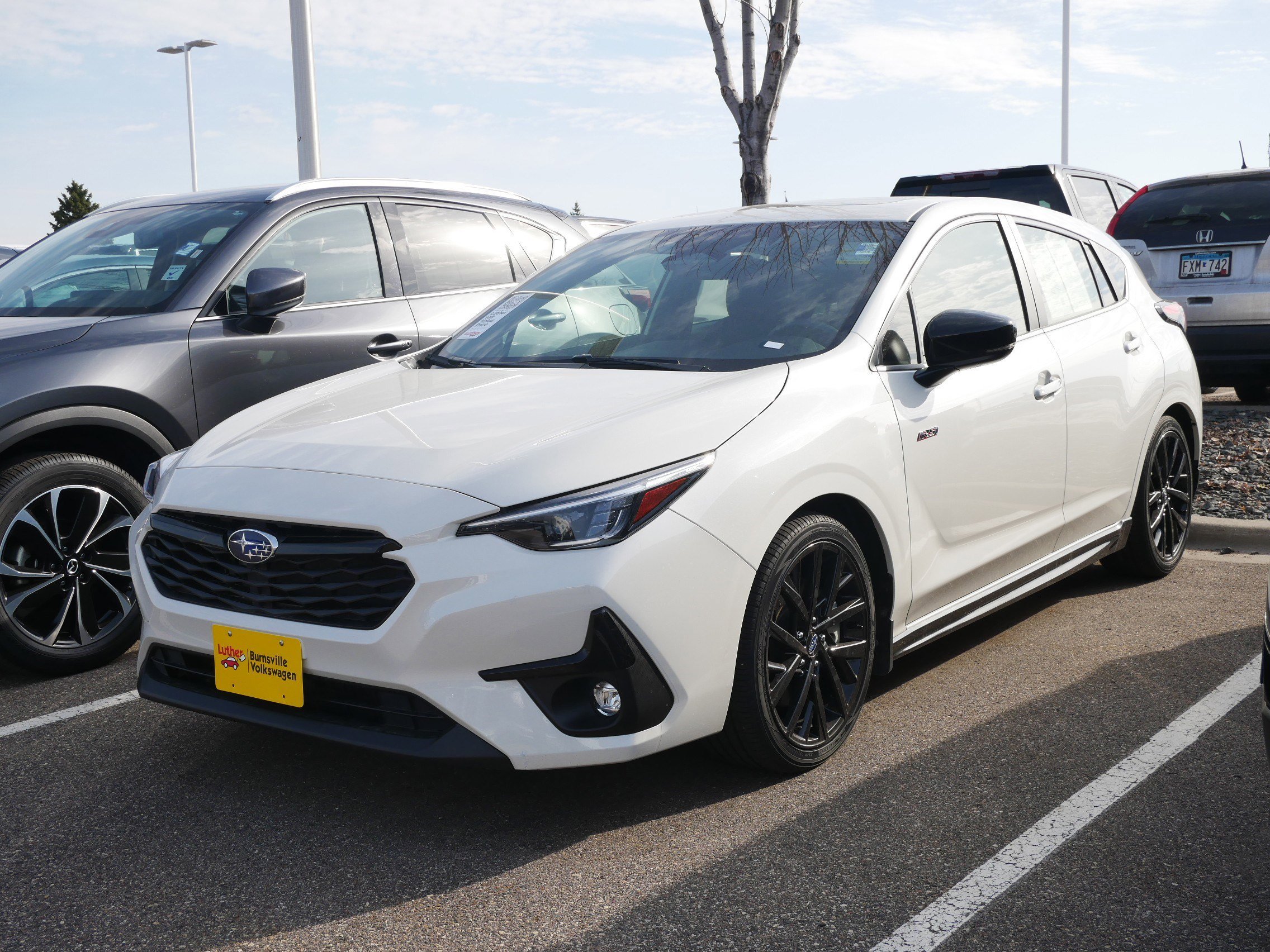 Used 2024 Subaru Impreza RS with VIN JF1GUHJC1R8301178 for sale in Brooklyn Center, Minnesota